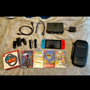Nintendo Switch + Games + Joy-Con Wheel